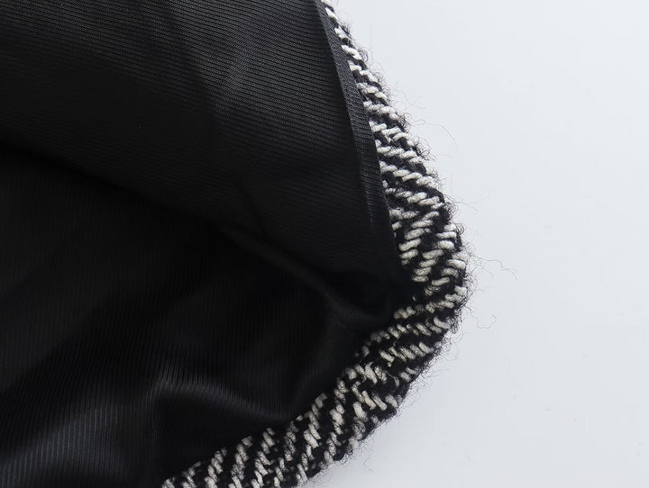 Modischer Damenmantel mit trendigem Fischgrätenmuster für einen eleganten Look