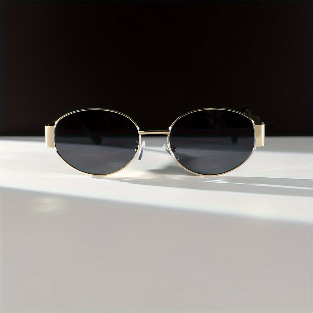 Majella | Stijlvolle Ovale Zonnebril met Luxe Gouden Frame voor een Elegante en Tijdloze uitstraling