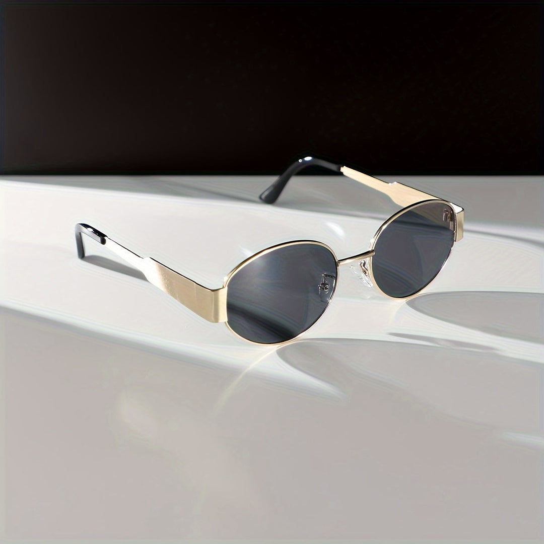 Majella | Stijlvolle Ovale Zonnebril met Luxe Gouden Frame voor een Elegante en Tijdloze uitstraling