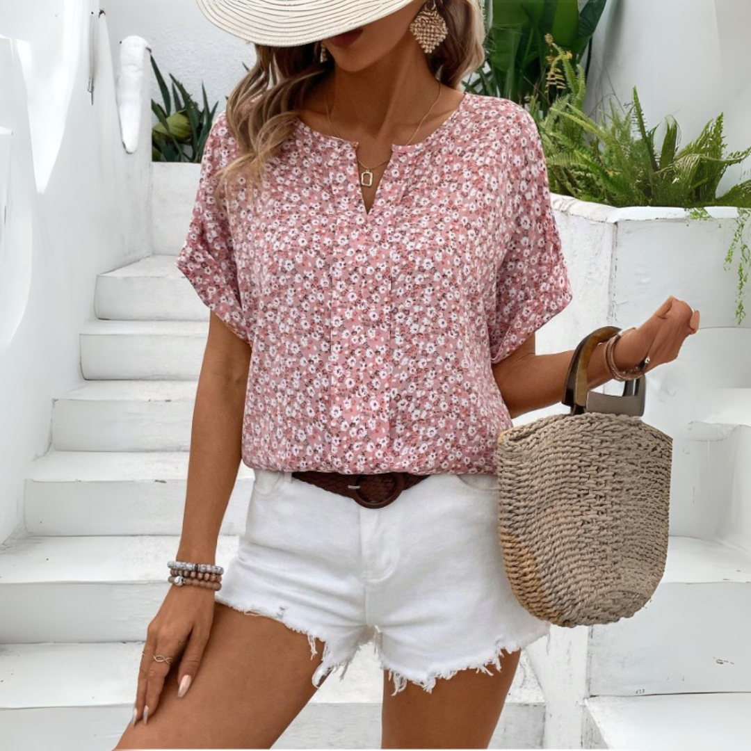 Stilvolle Damenbluse im Vintage-Look mit Blumenmuster - ein eleganter und modischer Look