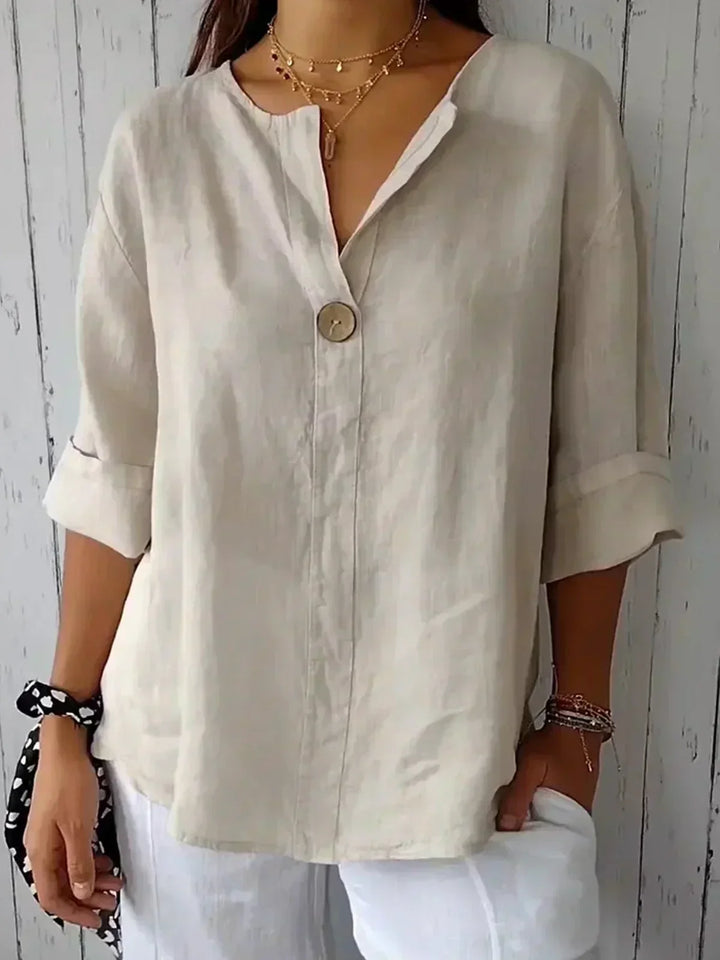 Elegante Damenbluse mit V-Ausschnitt und trendig gekrempelten 3/4-Ärmeln für die stilvolle Frau