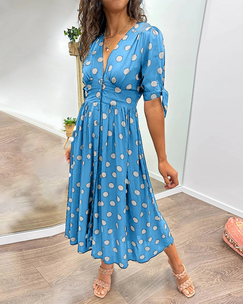 Mia™ gepunktetes Kleid mit gewagtem, tiefem Ausschnitt - außergewöhnliche Eleganz und einzigartiger Stil!