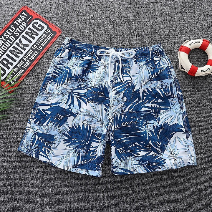 Stijlvolle heren zwembroek met trendy bladprint voor een frisse strandlook