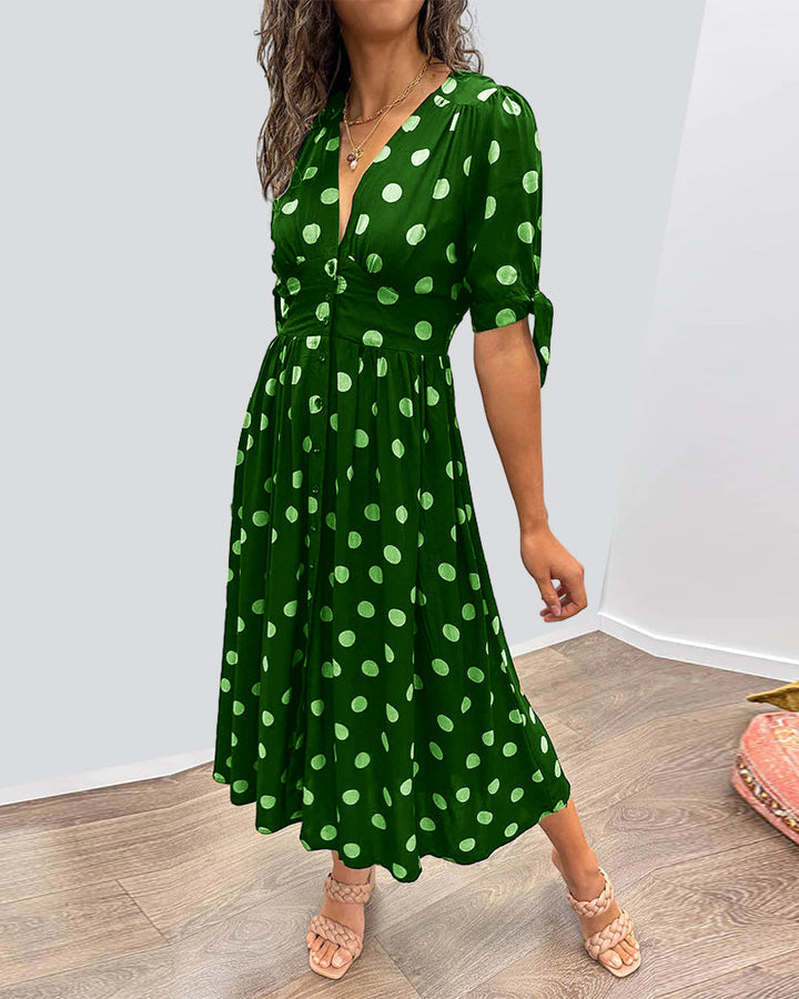 Mia™ gepunktetes Kleid mit gewagtem, tiefem Ausschnitt - außergewöhnliche Eleganz und einzigartiger Stil!