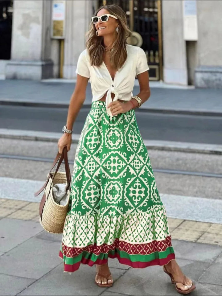 Stylowa damska spódnica midi z retro nadrukiem Liora – elegancja i klasyka na każdą okazję