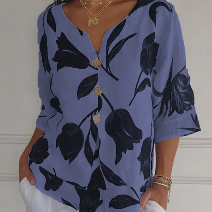 Elegante, feminine Bluse mit floralem Muster und spitzem Ausschnitt für einen einzigartigen Stil
