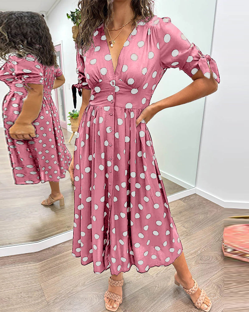 Mia™ gepunktetes Kleid mit gewagtem, tiefem Ausschnitt - außergewöhnliche Eleganz und einzigartiger Stil!
