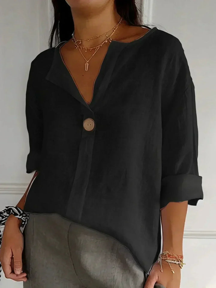 Elegante Damenbluse mit V-Ausschnitt und trendig gekrempelten 3/4-Ärmeln für die stilvolle Frau