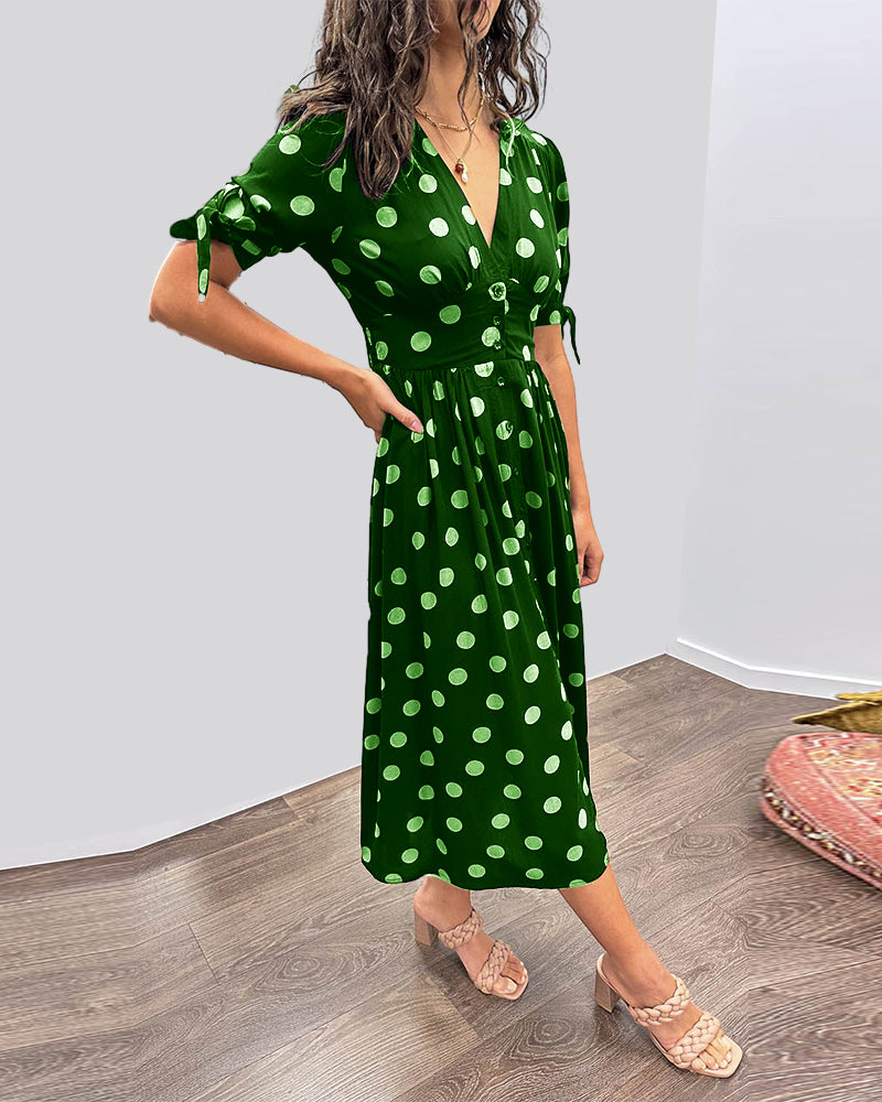 Mia™ gepunktetes Kleid mit gewagtem, tiefem Ausschnitt - außergewöhnliche Eleganz und einzigartiger Stil!