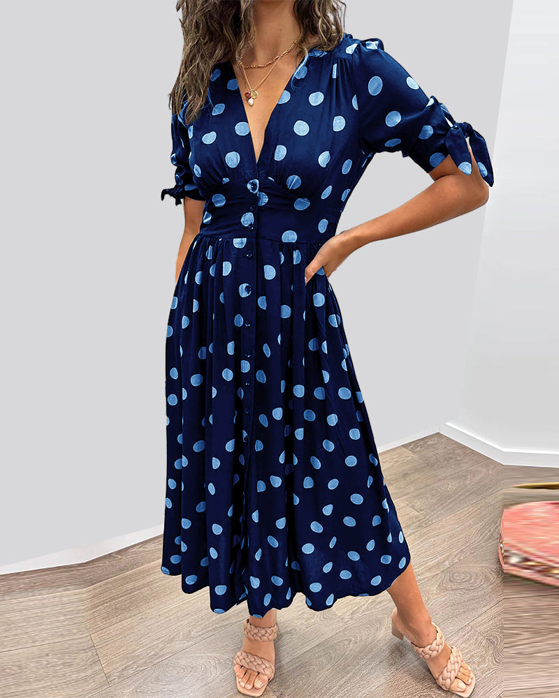 Mia™ gepunktetes Kleid mit gewagtem, tiefem Ausschnitt - außergewöhnliche Eleganz und einzigartiger Stil!