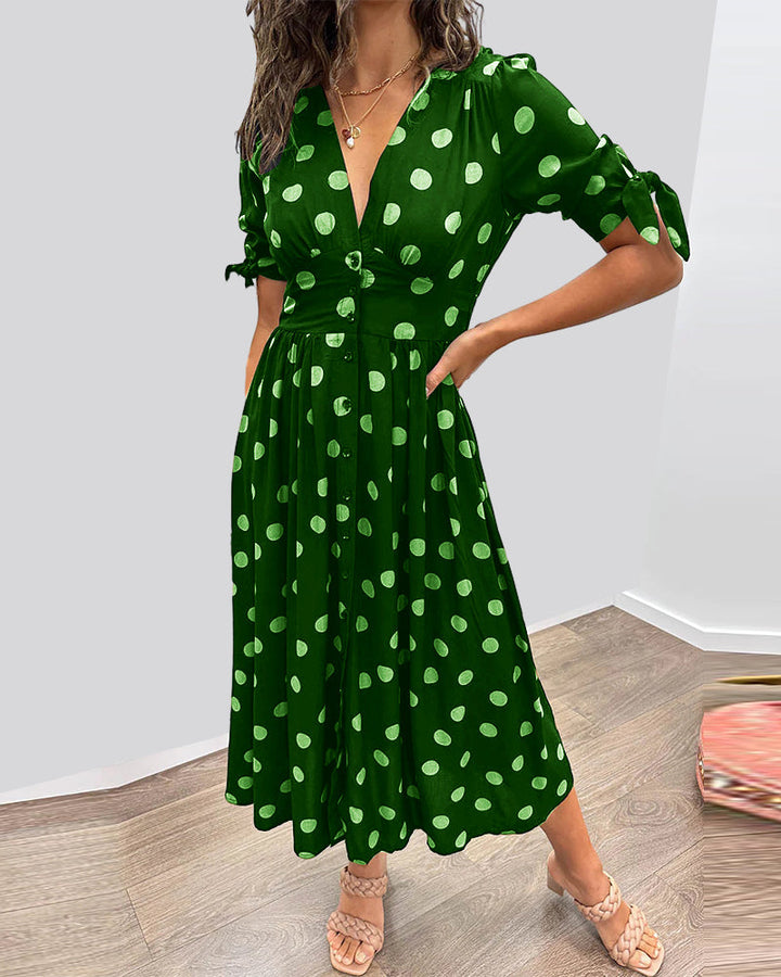 Mia™ gepunktetes Kleid mit gewagtem, tiefem Ausschnitt - außergewöhnliche Eleganz und einzigartiger Stil!