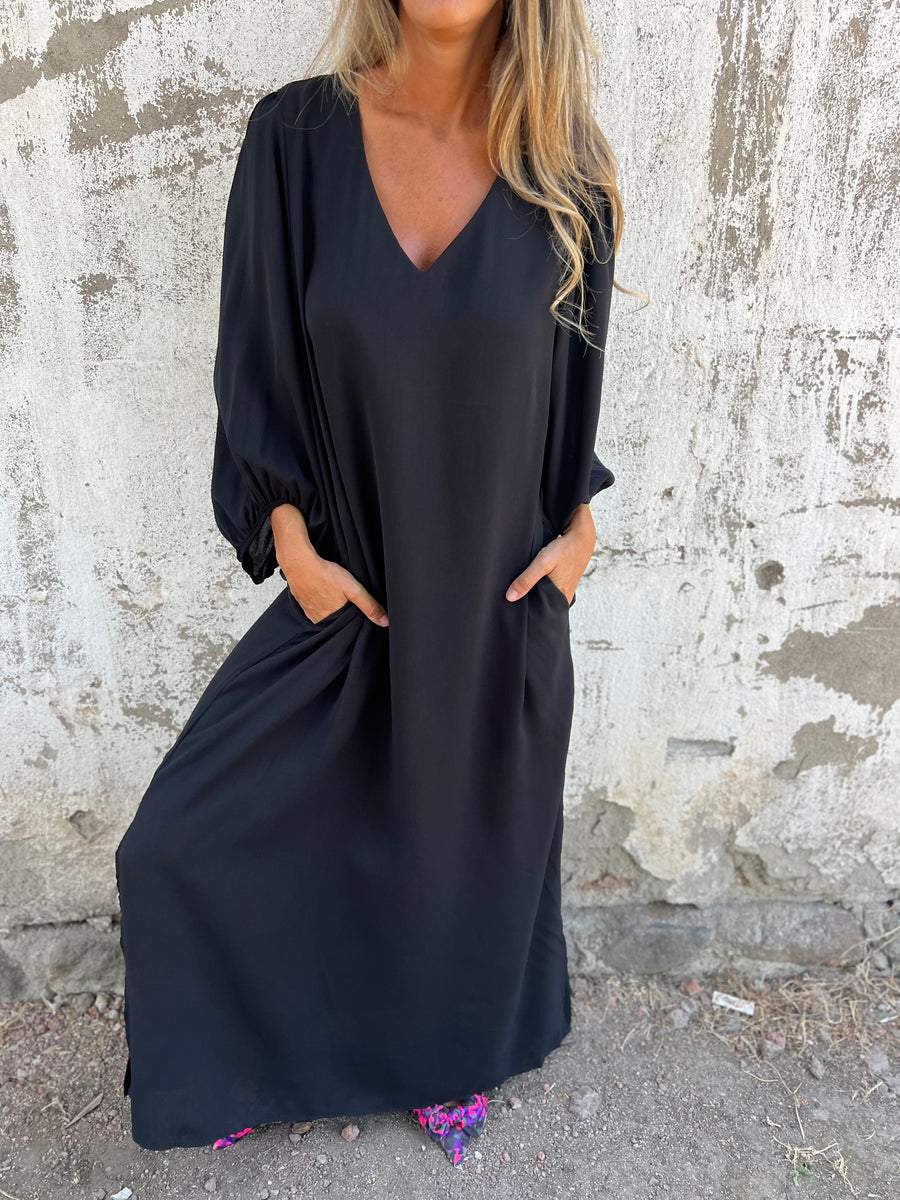 Elegantes Damen Maxikleid mit spitzem Ausschnitt - ein stilvoller und eleganter Look