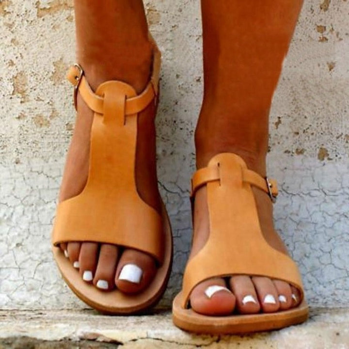 Stilvolle und bequeme klassische flache Damensandalen für einen eleganten Look