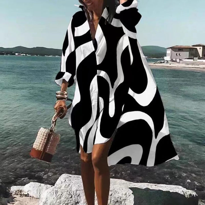 Stylisches Damenkleid mit spitzem Ausschnitt und langen Ärmeln - die perfekte Wahl für besondere Anlässe