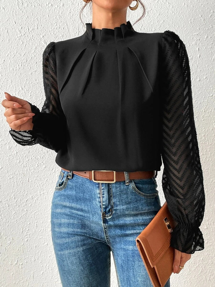 Ein stilvolles Damenoberteil mit einem eleganten Muster, das Ihrer Garderobe Klasse verleiht