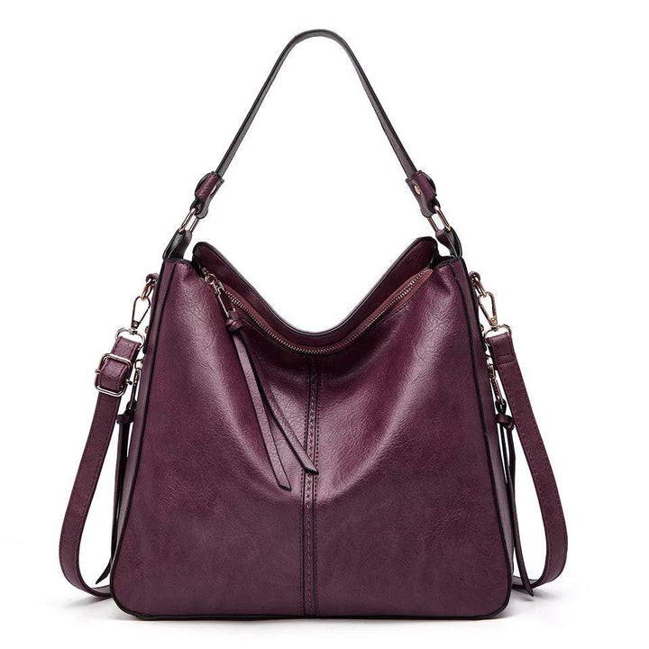 Ersilia™ - Elegancka i pojemna skórzana torba z funkcjonalnymi bocznymi kieszeniami