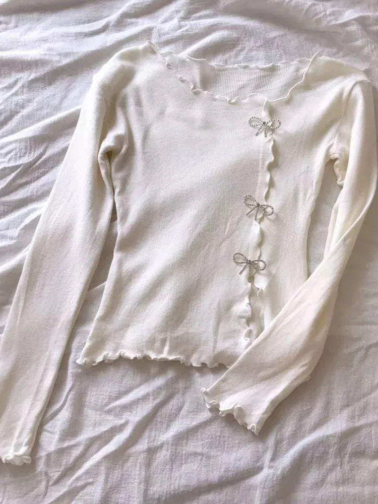 Eleganter Damenpullover mit bezaubernden Schleifen - eine stilvolle und modische Option für jede Gelegenheit