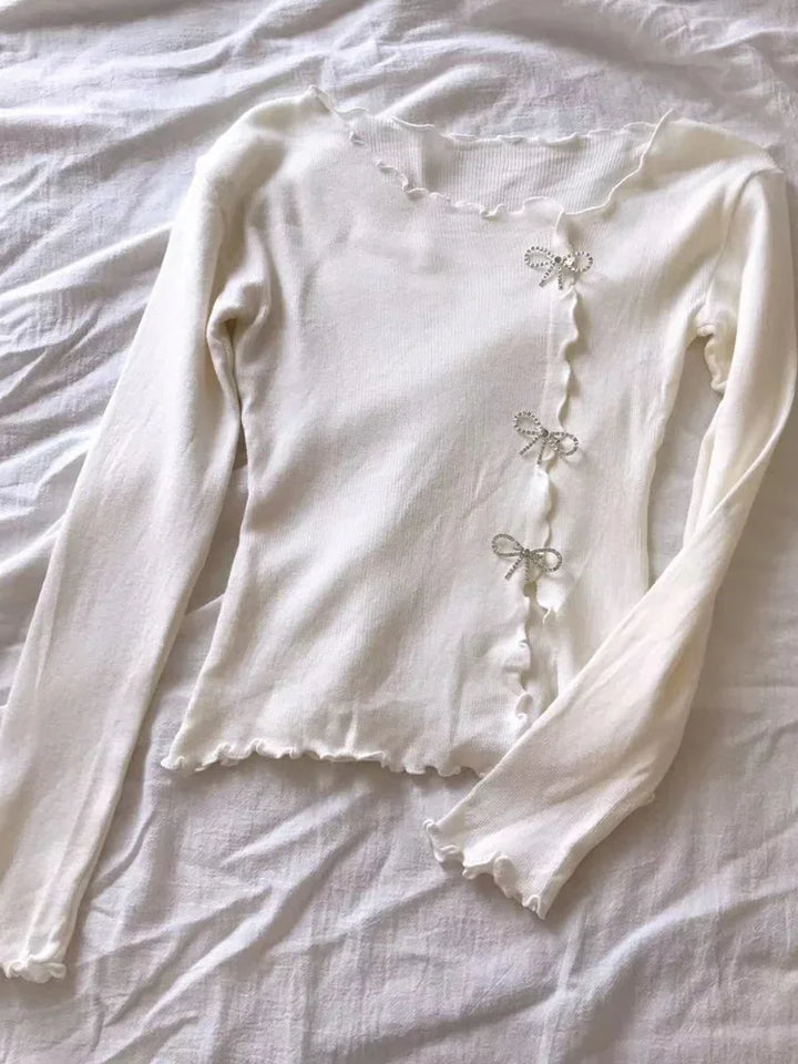 Eleganter Damenpullover mit bezaubernden Schleifen - eine stilvolle und modische Option für jede Gelegenheit