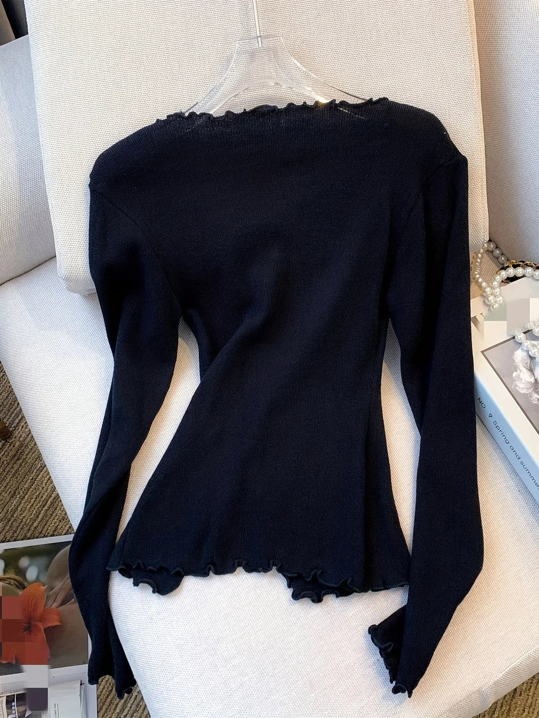 Eleganter Damenpullover mit bezaubernden Schleifen - eine stilvolle und modische Option für jede Gelegenheit
