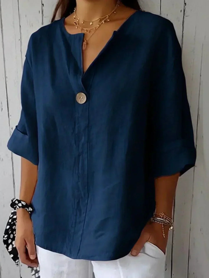 Elegante Damenbluse mit V-Ausschnitt und trendig gekrempelten 3/4-Ärmeln für die stilvolle Frau