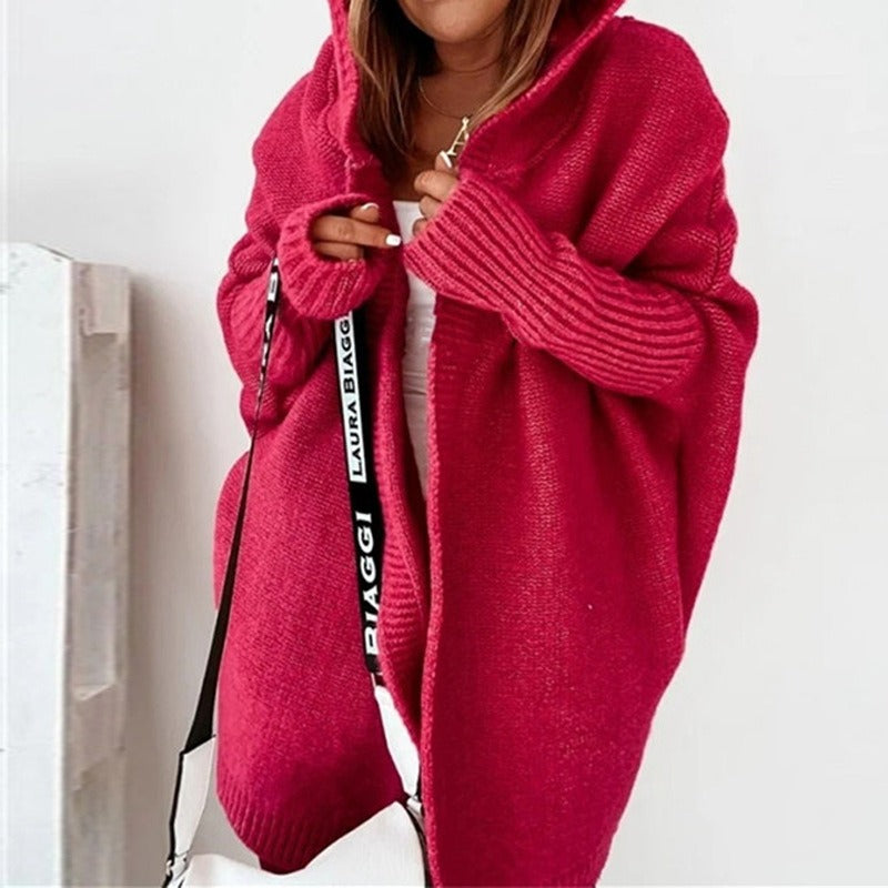 Die elegante Damenstrickjacke verleiht einen Hauch von Klasse und Schick