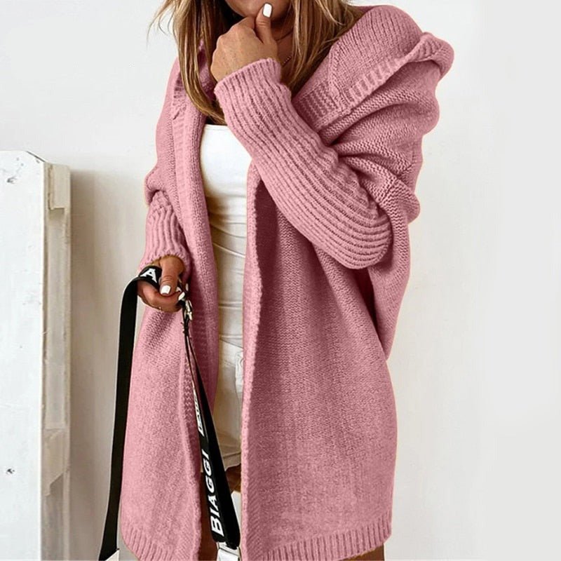 Die elegante Damenstrickjacke verleiht einen Hauch von Klasse und Schick