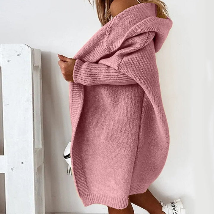Die elegante Damenstrickjacke verleiht einen Hauch von Klasse und Schick