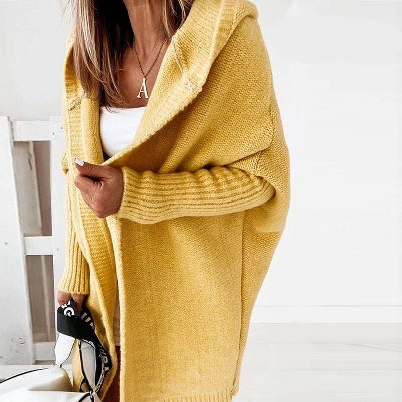 Die elegante Damenstrickjacke verleiht einen Hauch von Klasse und Schick