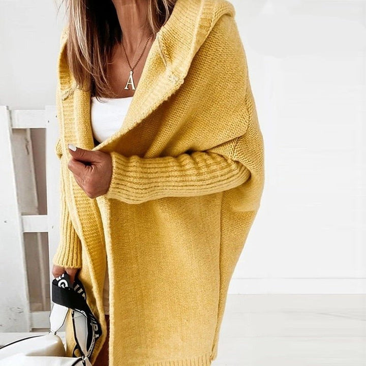 Die elegante Damenstrickjacke verleiht einen Hauch von Klasse und Schick