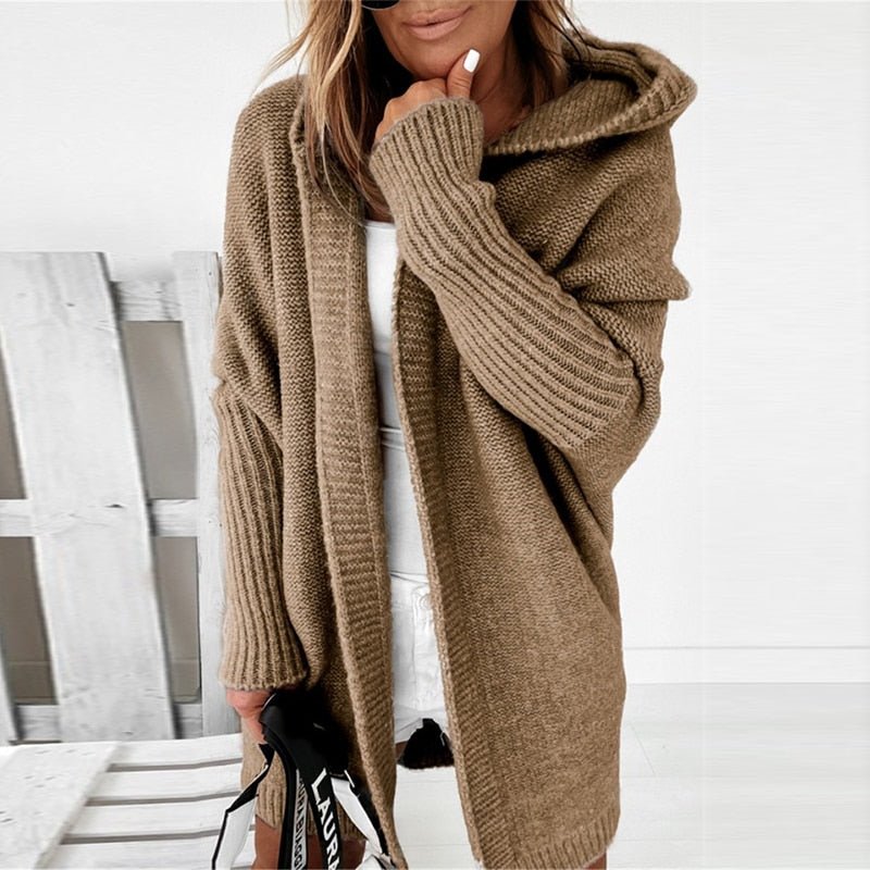 Die elegante Damenstrickjacke verleiht einen Hauch von Klasse und Schick