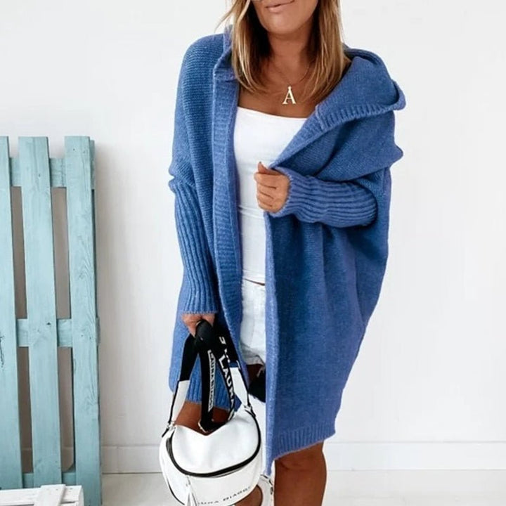 Die elegante Damenstrickjacke verleiht einen Hauch von Klasse und Schick