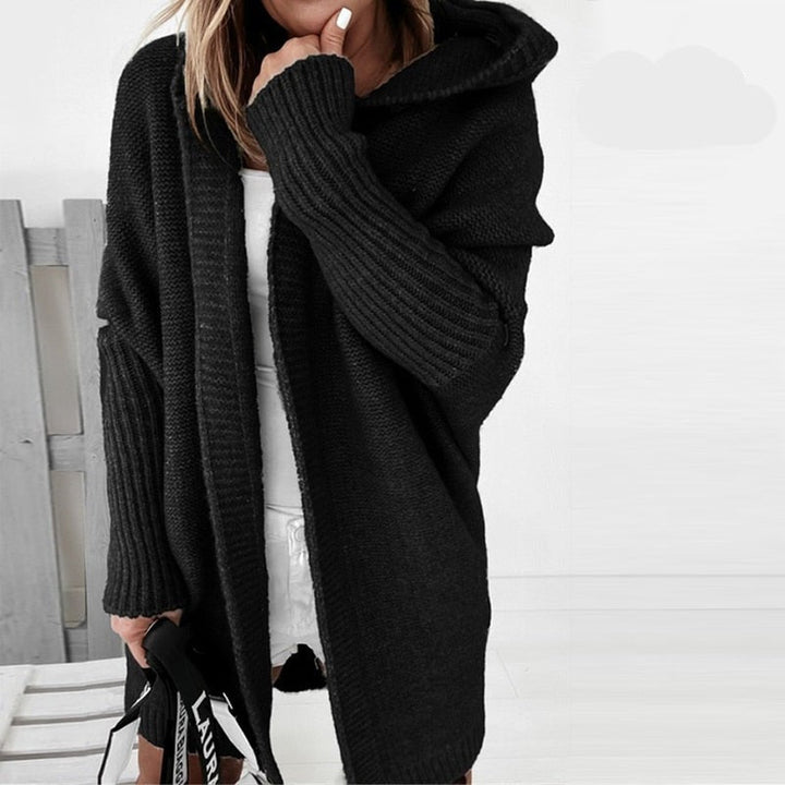 Die elegante Damenstrickjacke verleiht einen Hauch von Klasse und Schick
