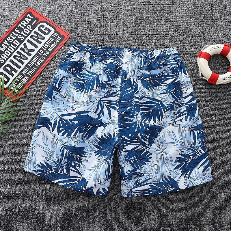 Stijlvolle heren zwembroek met trendy bladprint voor een frisse strandlook