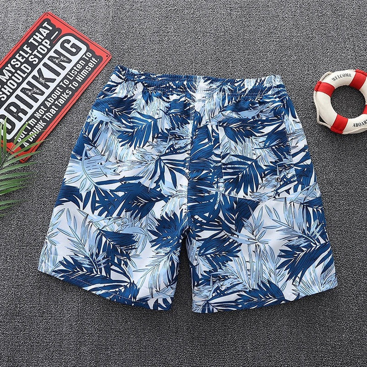 Stijlvolle heren zwembroek met trendy bladprint voor een frisse strandlook